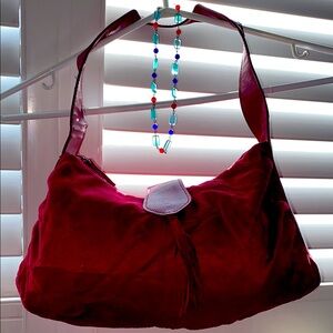 Vintage Elegant Burgundy Suede Shoulder Bag with beautiful necklace.
